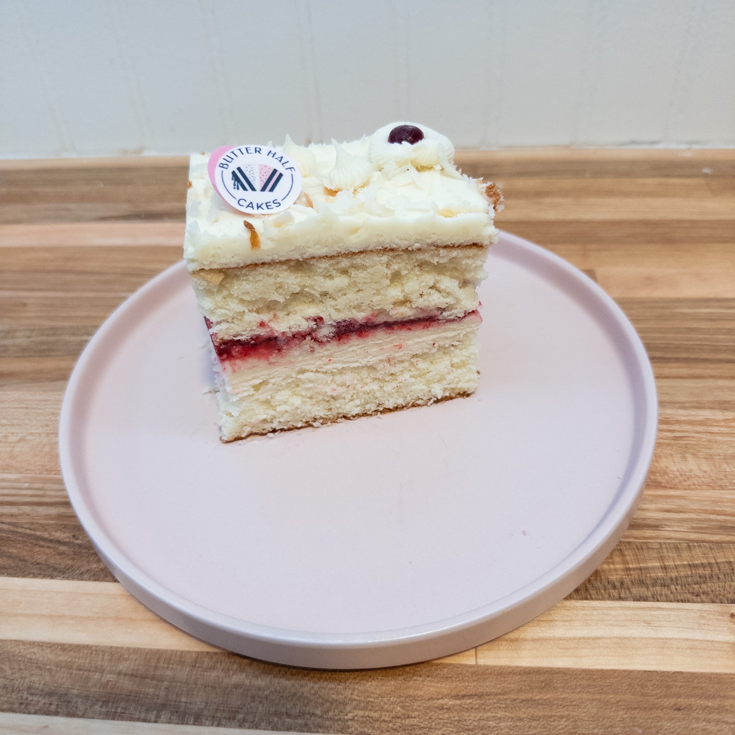 Cake Slab - Toasted coconut sponge, cream cheese frosting, blackberry lime and mint filling