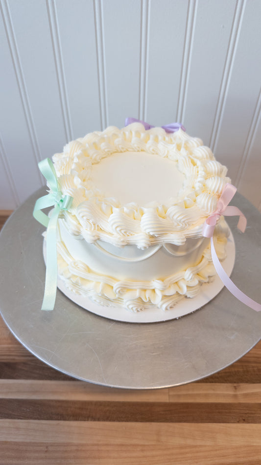 6" 2 layer (8 servings) -  Vanilla sponge, strawberry compote, vanilla buttercream